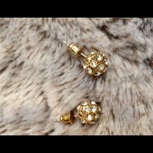 Shiney stud earrings.